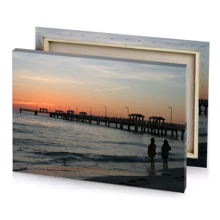 a couple walking on the beach dim gray canvas
