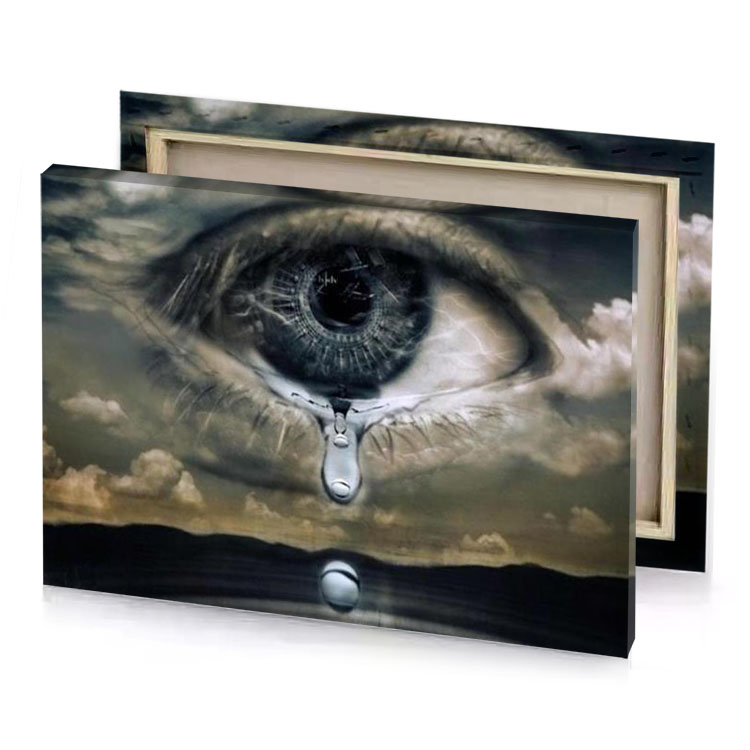 a crying eye with tear in the middle camouflage green canvas