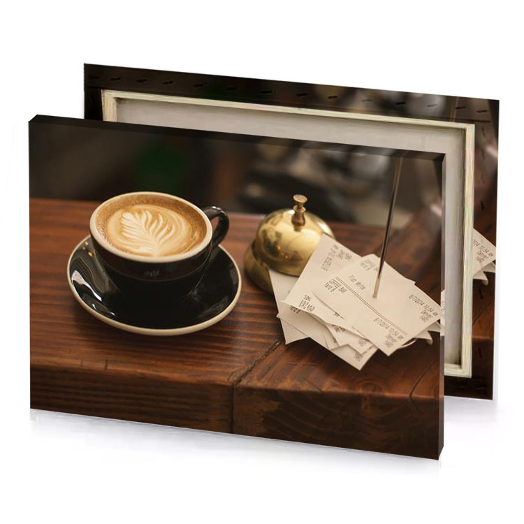 a cup of coffee and paper on table tan canvas