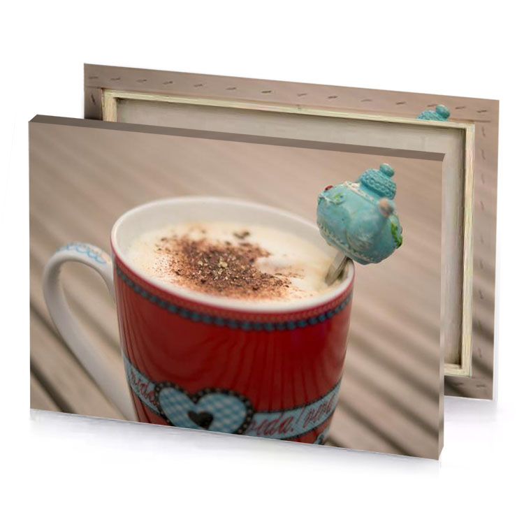 a cup of coffee with bird on top maroon canvas