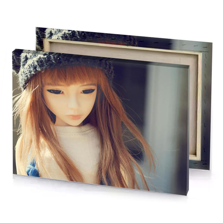 a doll wearing hat and sweater charcoal canvas