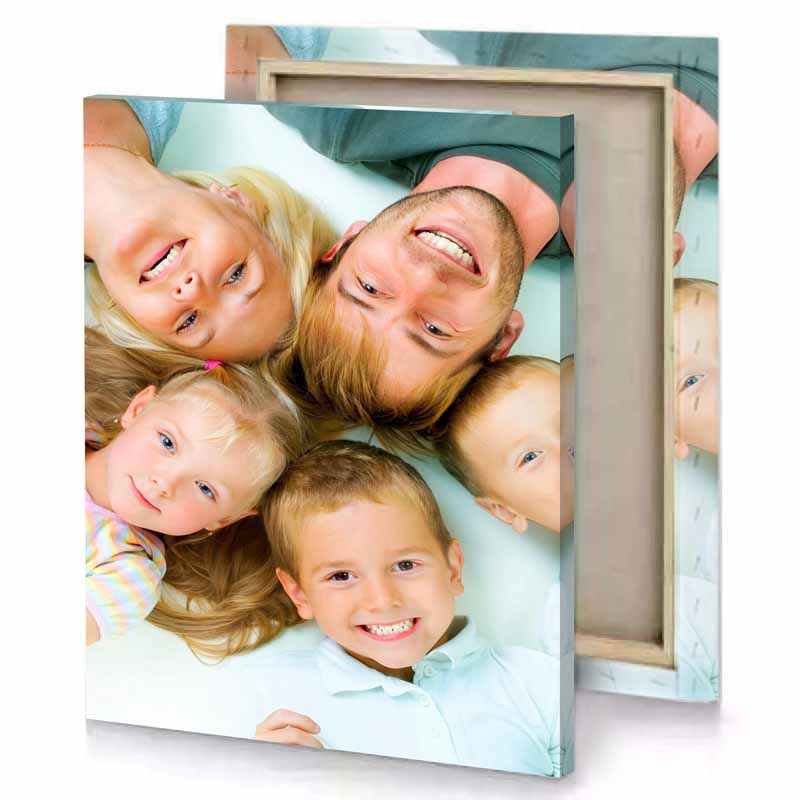 a family of four is laying on the floor white smoke canvas