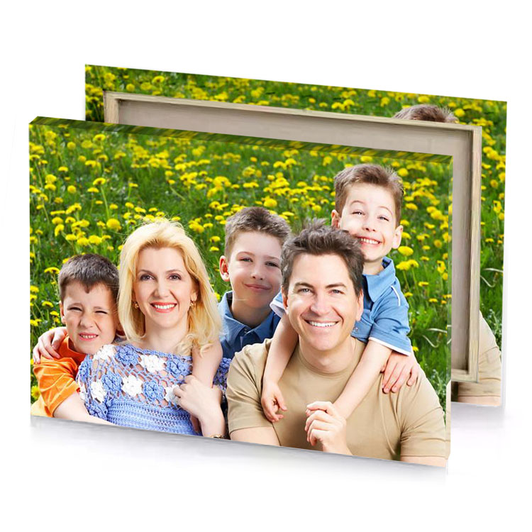a family poses for picture in field of flowers olive drab canvas
