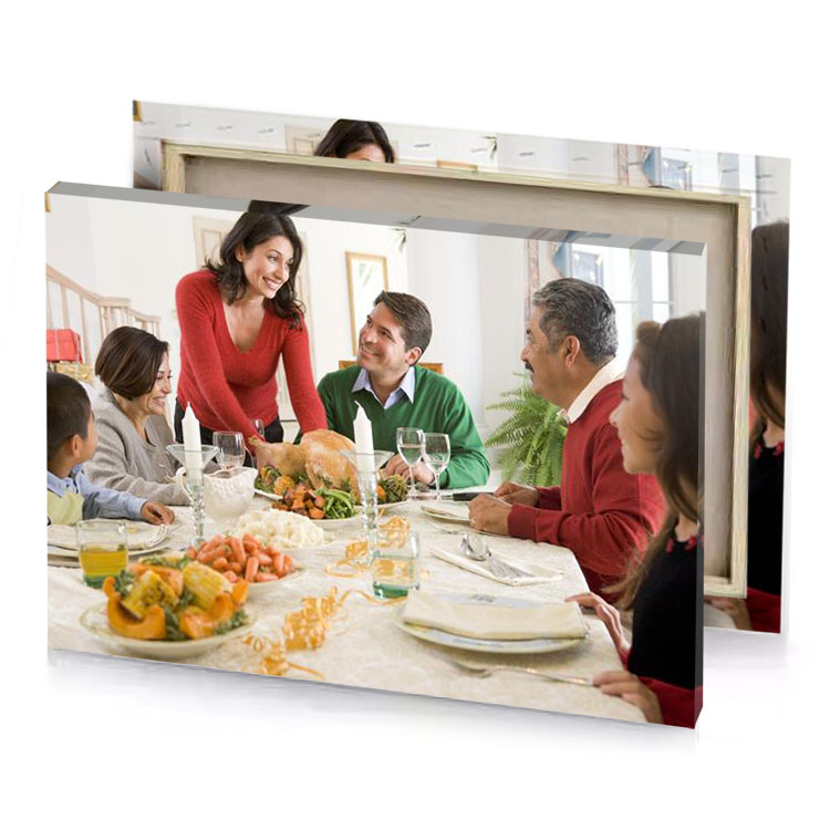 a family sitting around table for thanksgiving dinner platinum canvas