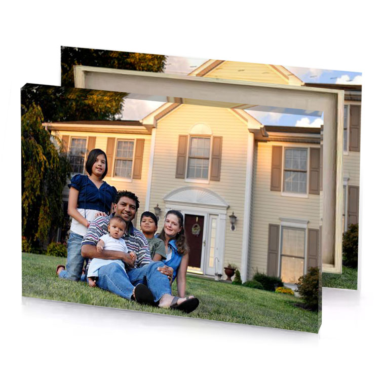 a family sitting in front of house dim gray canvas