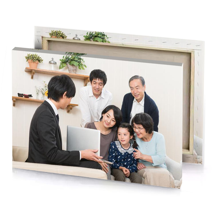 a family sitting on couch platinum canvas