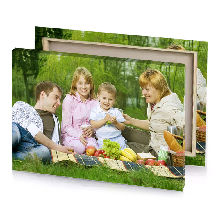 a family sitting on the grass in park dark olive green canvas
