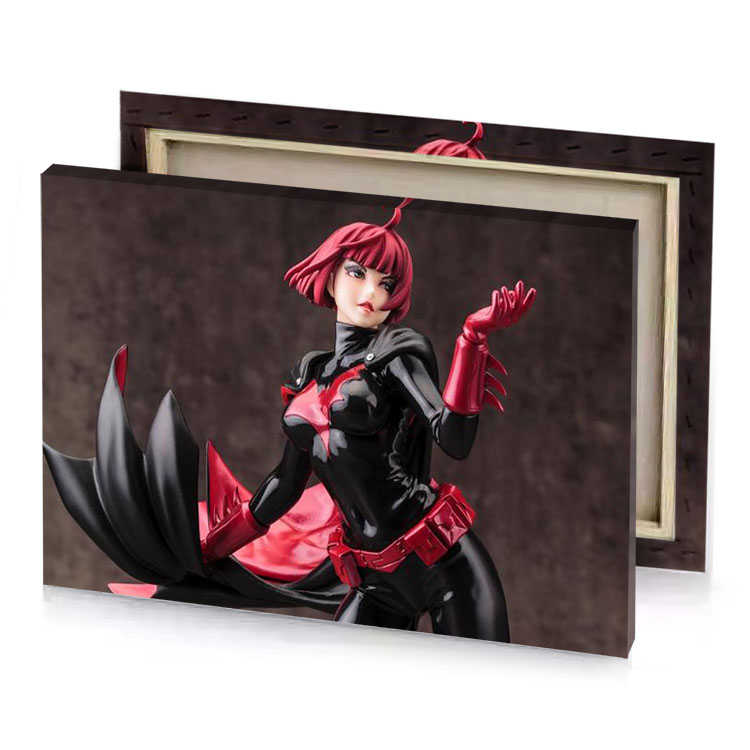 a figure of woman in black and red outfit taupe canvas