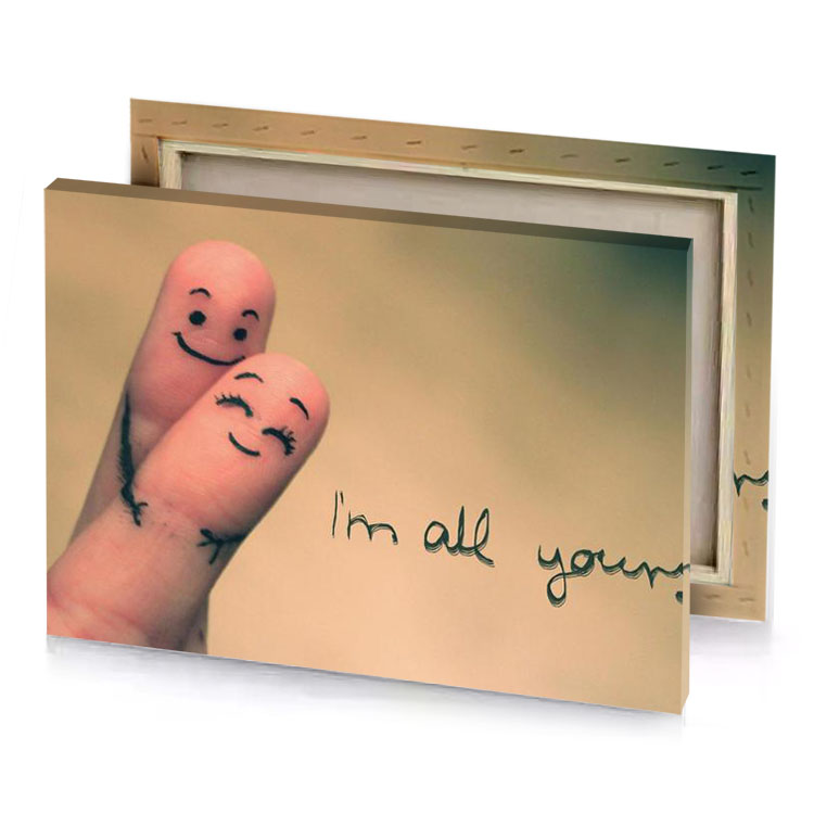 a finger with smiley face drawn on it camouflage green canvas