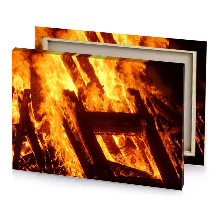 a fire burning in the dark tangerine canvas