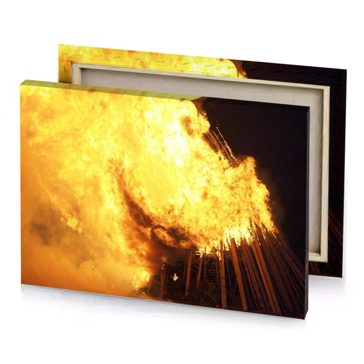 a fire is burning in the dark khaki canvas