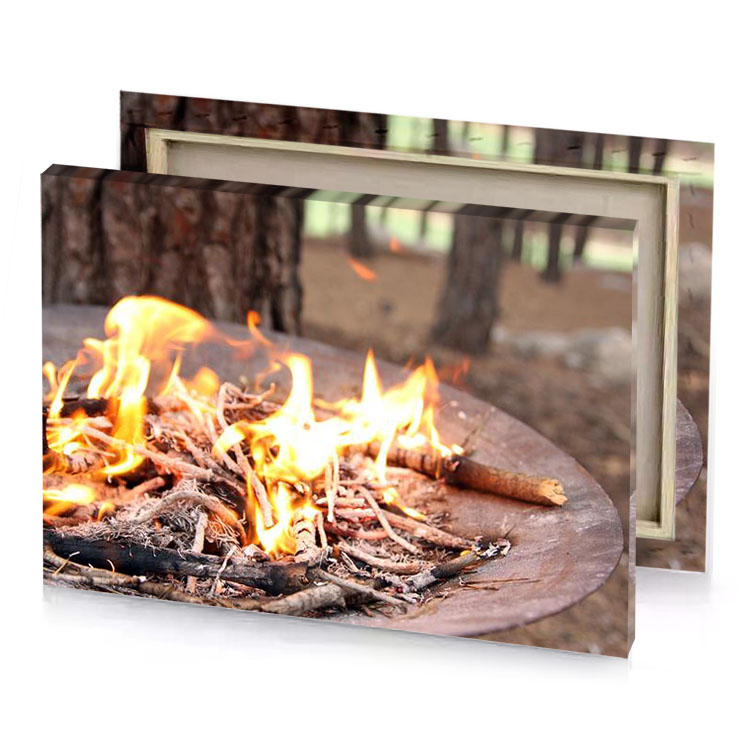 a fire pit with burning in it papaya whip canvas