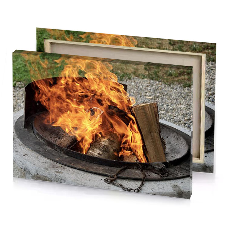 a fire pit with burning inside sand brown canvas