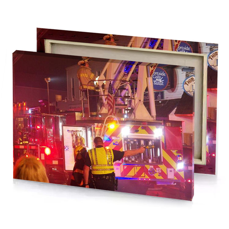 a fire truck is parked in front of building garnet canvas