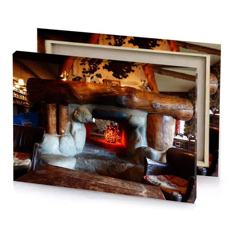 a fireplace in restaurant with leather chairs flame canvas