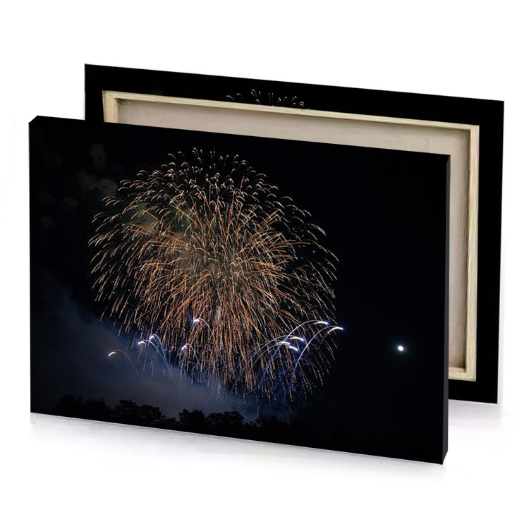 a fireworks is lit up the night sky garnet canvas