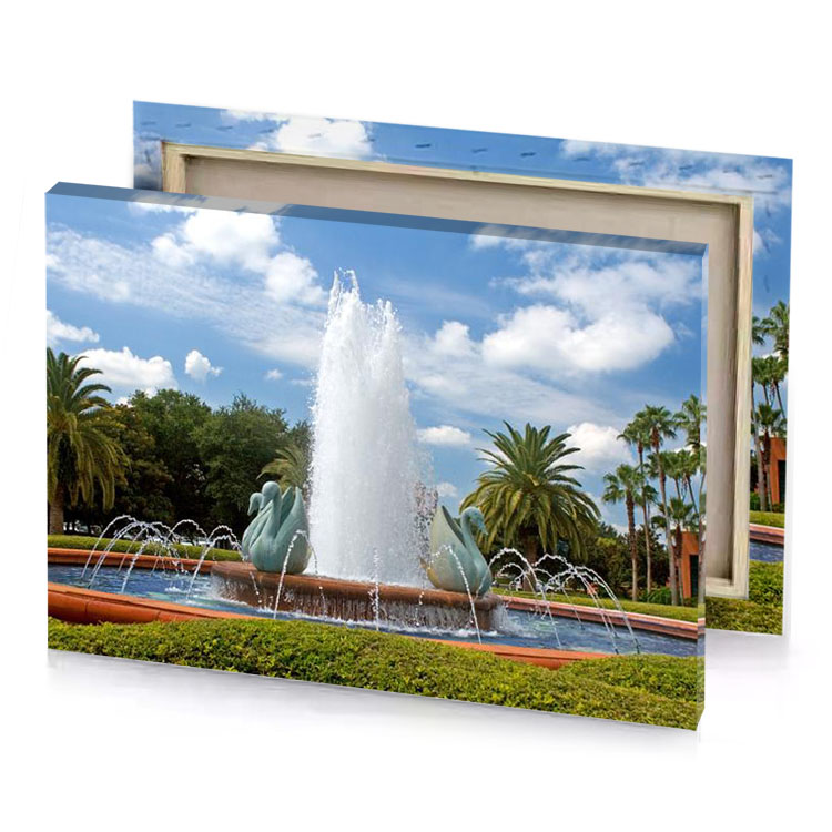 a fountain with water light steel blue canvas