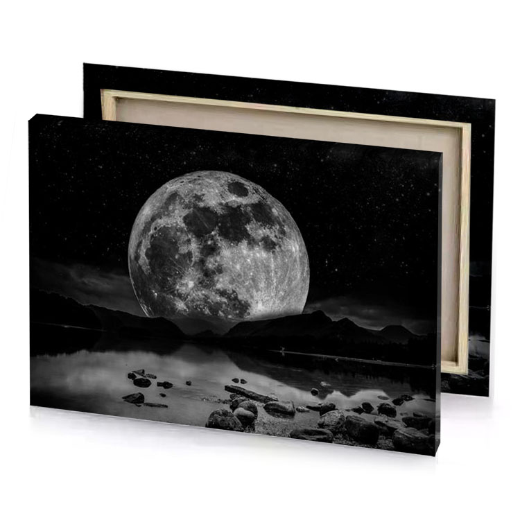 a full moon over lake with rocks and water gray canvas