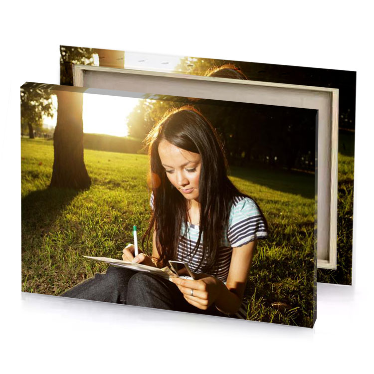 a girl sitting in the grass writing sepia canvas