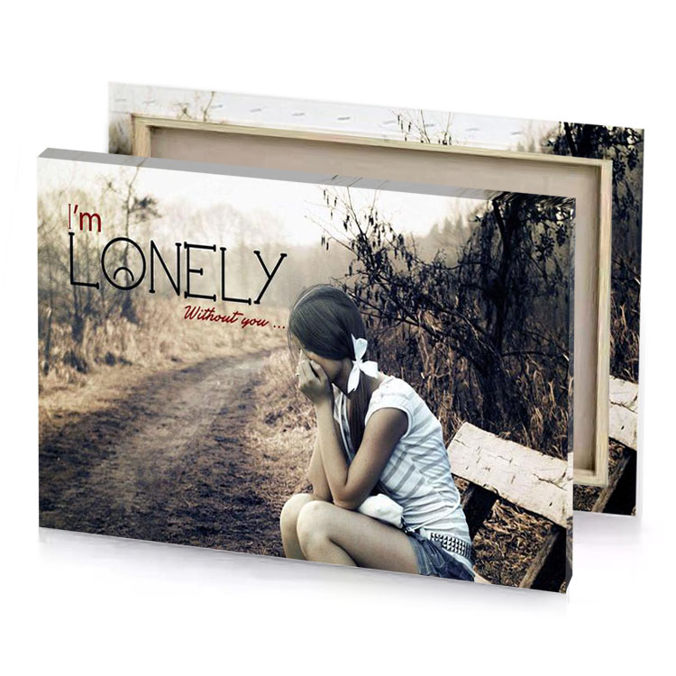 a girl sitting on bench in the middle of field tan canvas