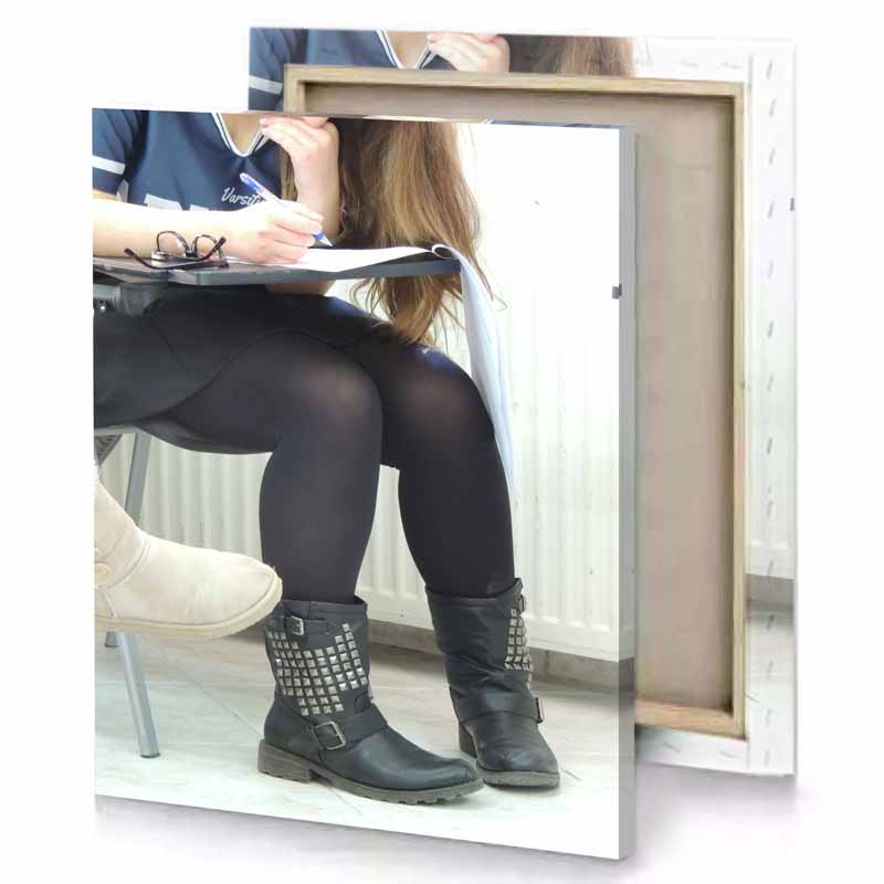 a girl sitting on chair writing taupe canvas