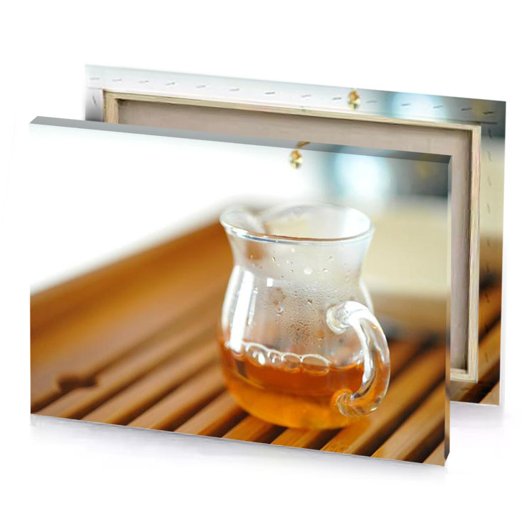 a glass of tea on wooden table copper canvas