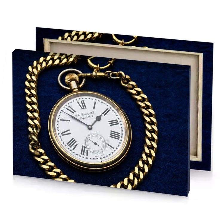 a gold pocket watch with chain around it platinum canvas