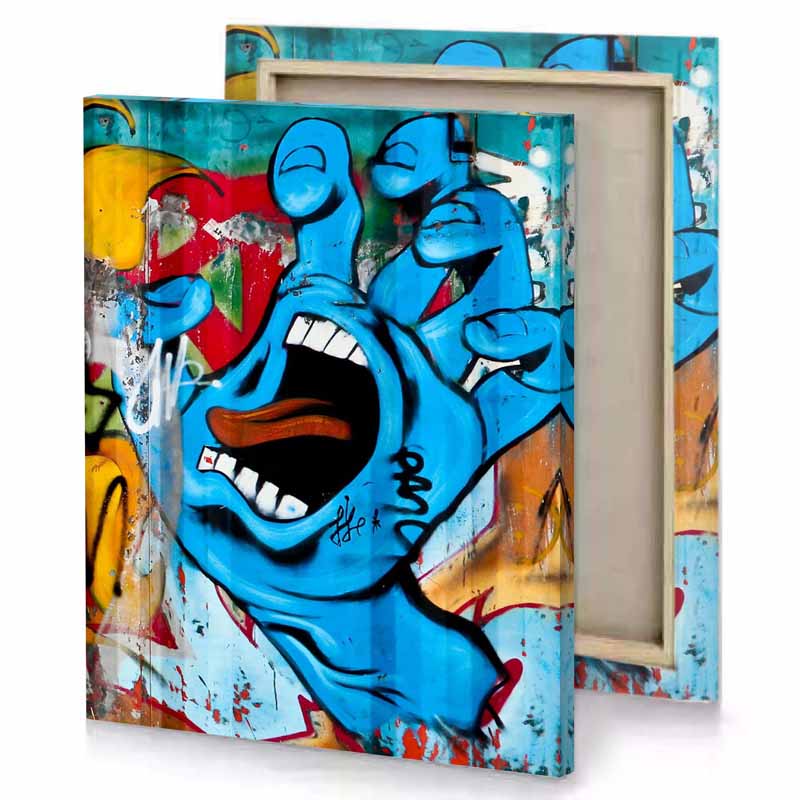 a graffiti wall with blue and red painting turquoise canvas