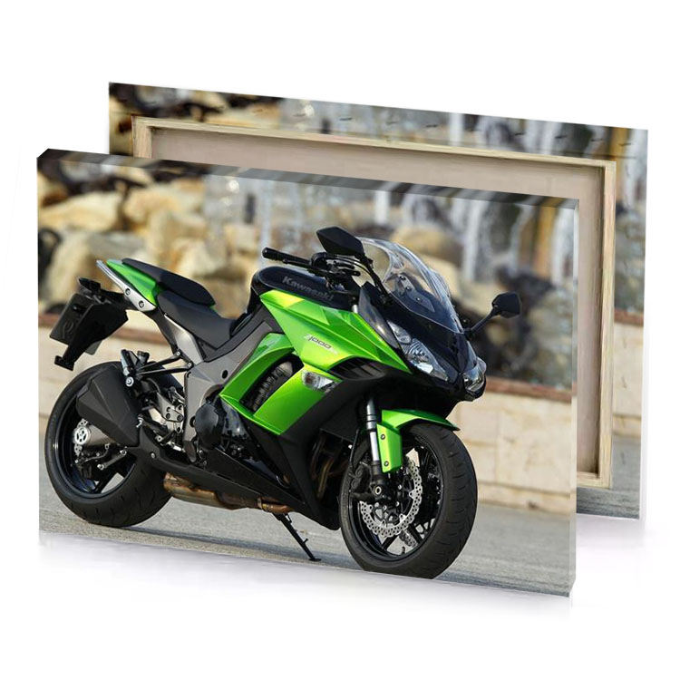 a green motorcycle parked on the side of road kelly canvas