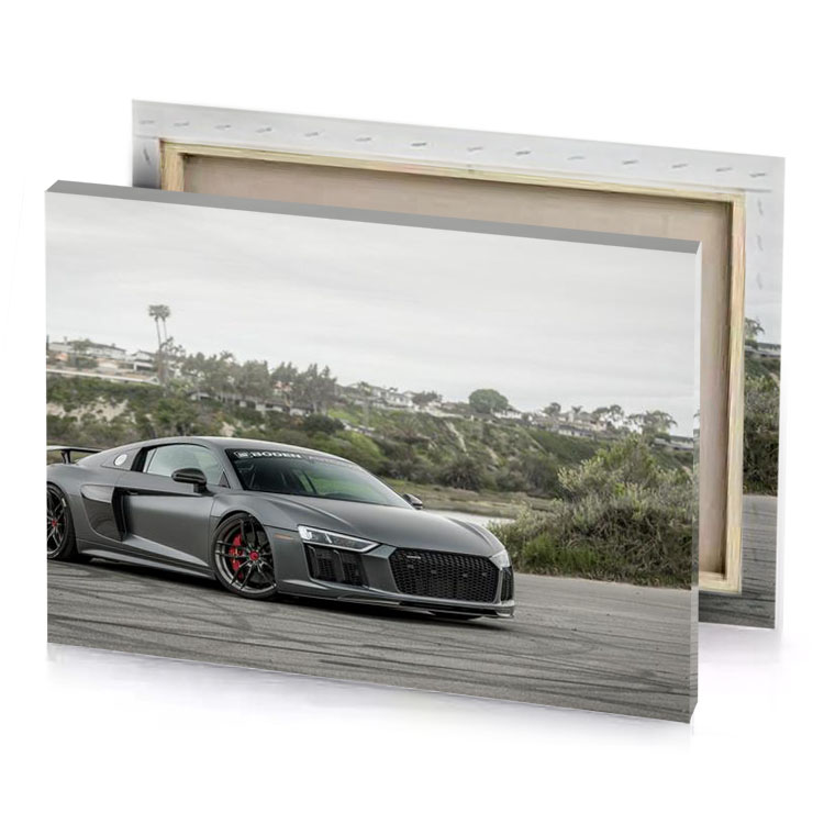 a grey audi sports car parked in parking lot smoky black canvas