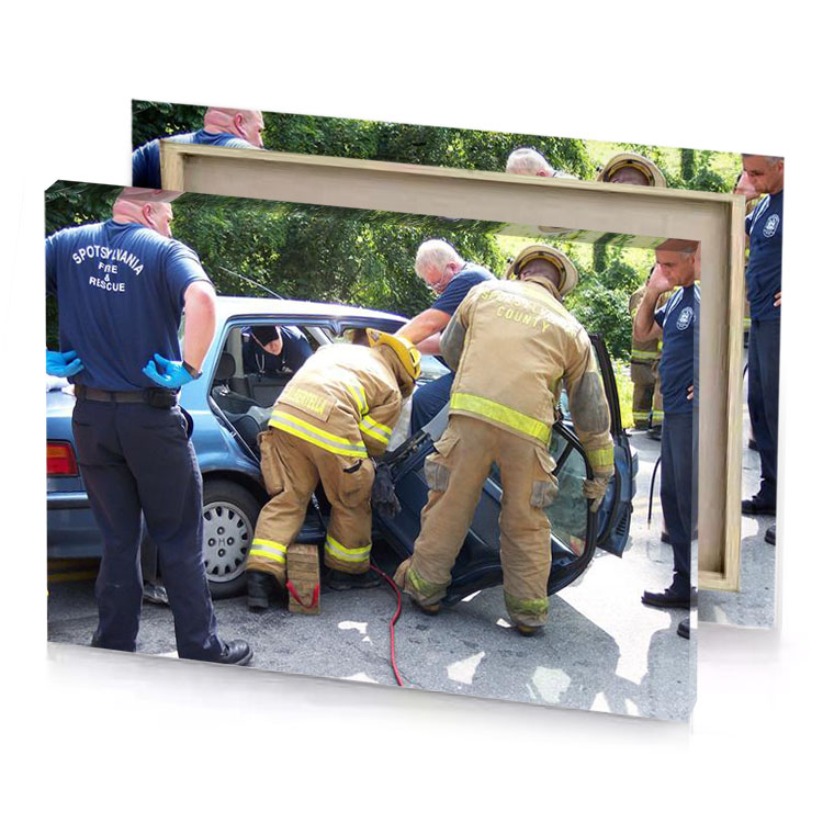 a group of firefighters working on car camouflage green canvas