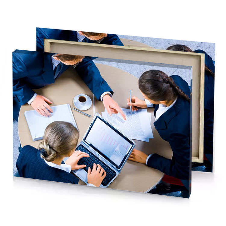 a group of people sitting around table with laptops lavender canvas