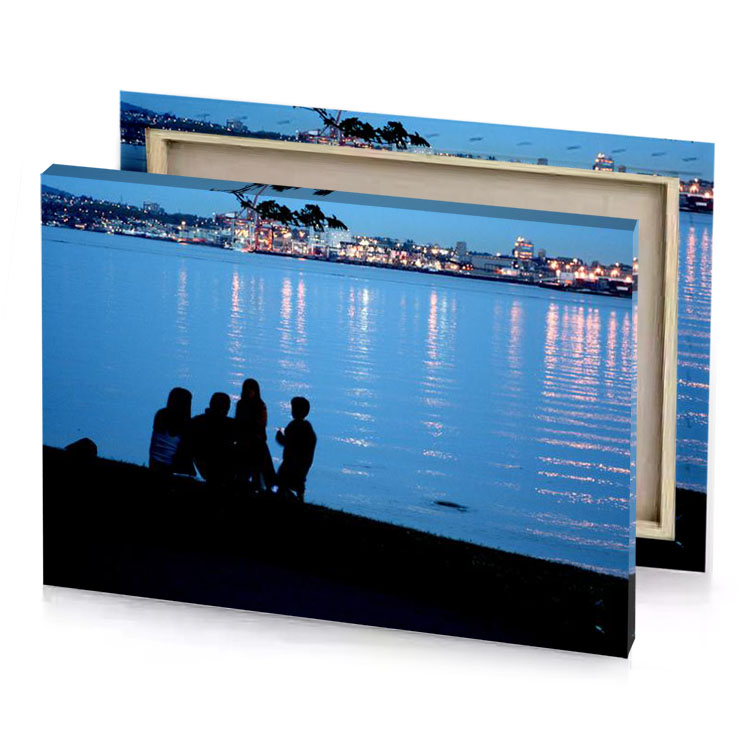 a group of people sitting on bench by the water maximum blue canvas