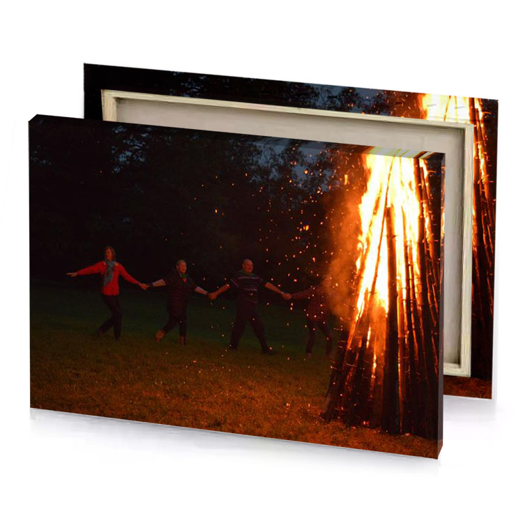 a group of people standing around fire sepia canvas