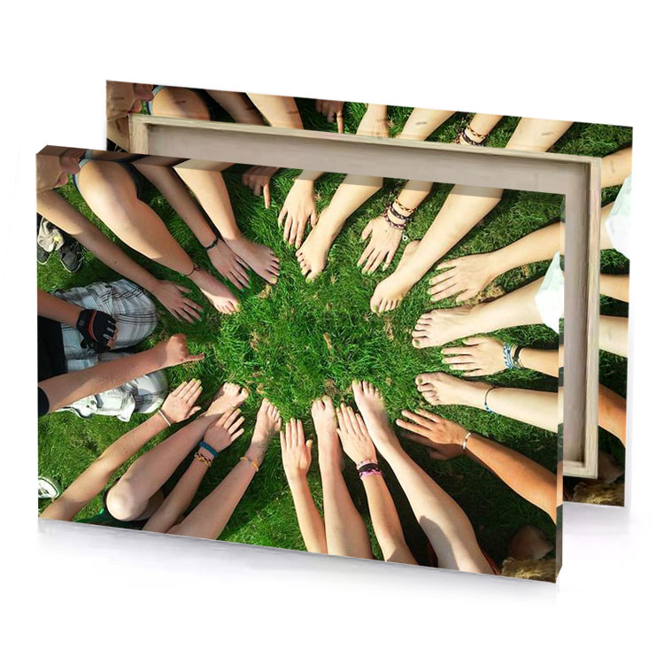a group of people standing in circle hunter green canvas