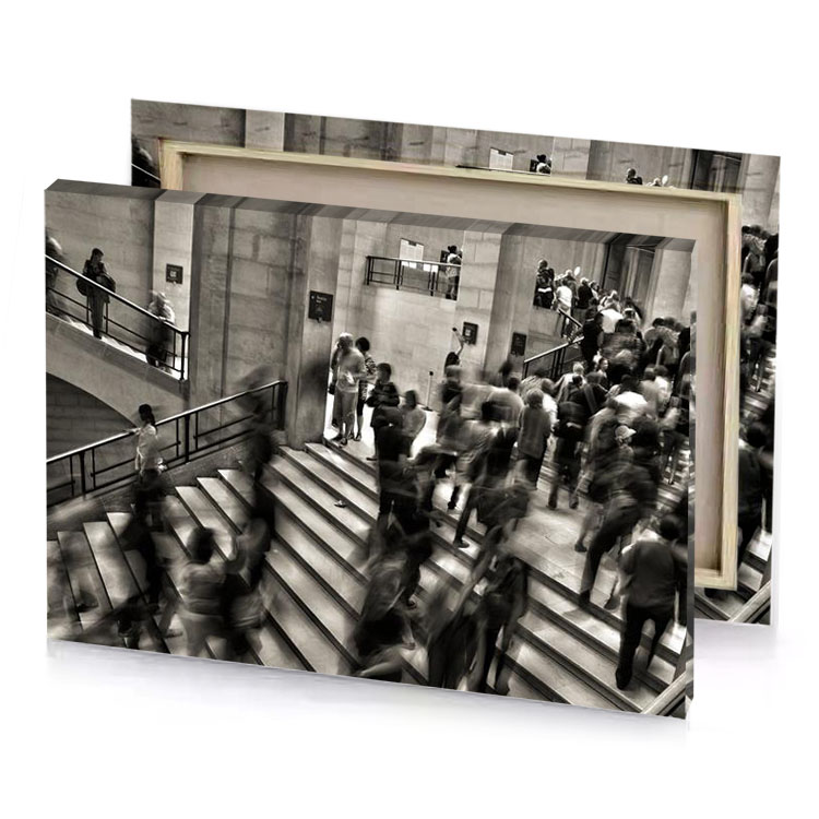 a group of people walking up set stairs silver canvas