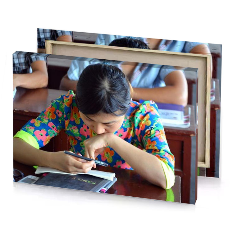 a group of young girls sitting at desks in classroom camouflage green canvas