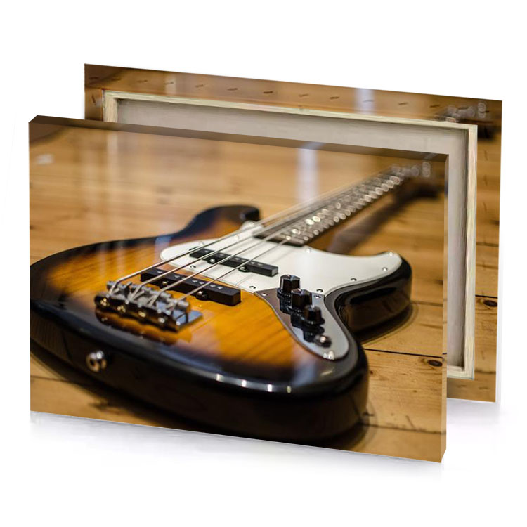 a guitar sitting on wooden floor dark golden rod canvas