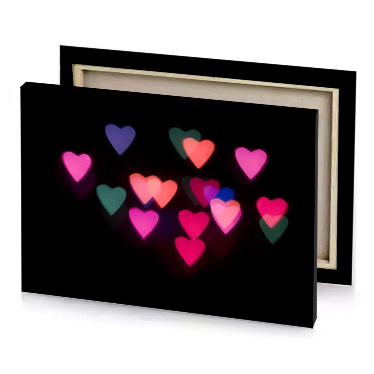 a heart made out of colored lights raspberry canvas