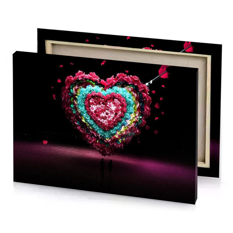 a heart shaped balloon with pink and blue brown canvas