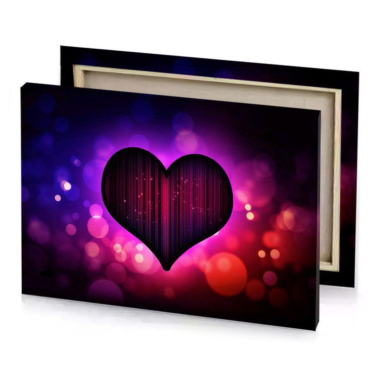 a heart shaped object on dark background violet canvas
