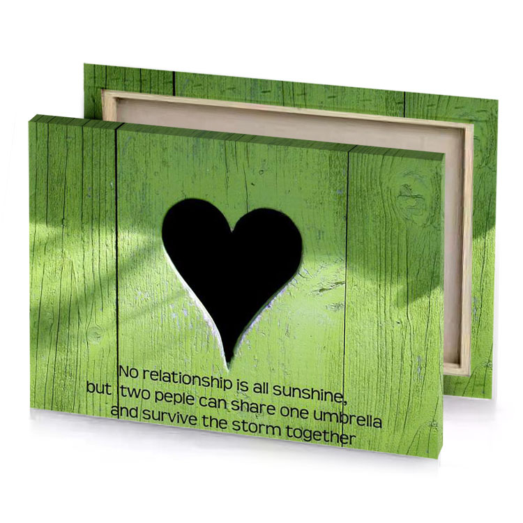 a heart shaped shadow on green wooden wall sage canvas