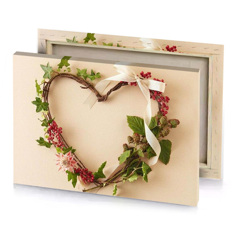 a heart shaped wreath with berries and leaves pearl canvas