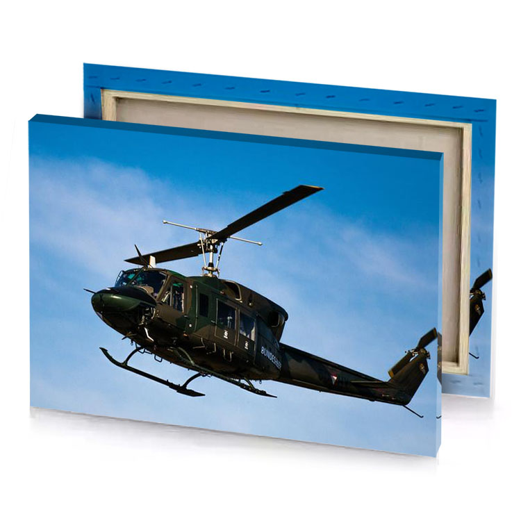 a helicopter flying in the sky with blue background smoky black canvas