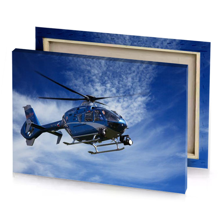 a helicopter flying through blue sky with white cloud charcoal canvas