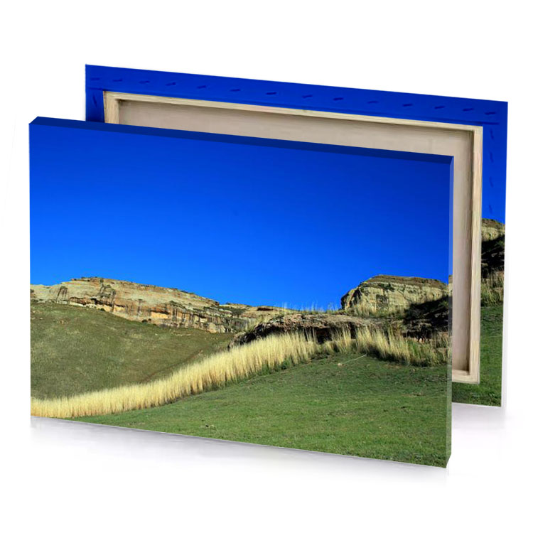 a hill with grassy hillside and blue sky dodger canvas