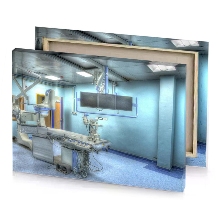 a hospital room with monitor and other equipment light blue canvas