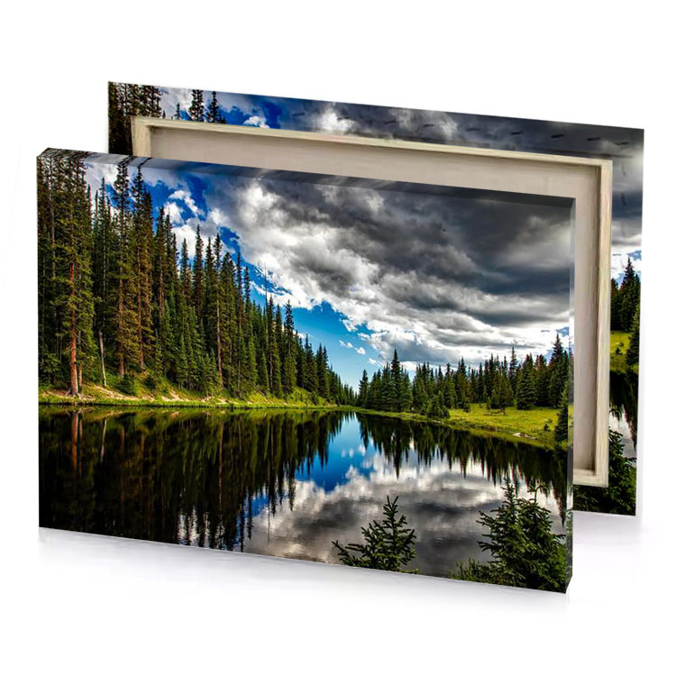 a lake surrounded by trees and clouds maximum blue canvas