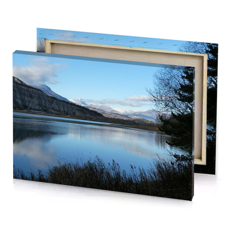 a lake with mountain in the background moonstone blue canvas
