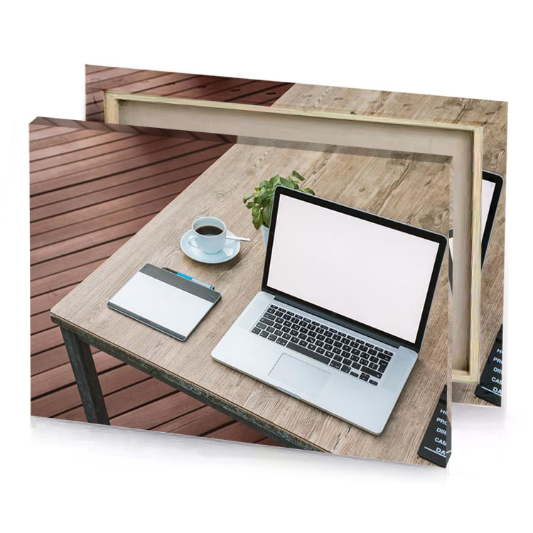 a laptop and cup of coffee on table platinum canvas